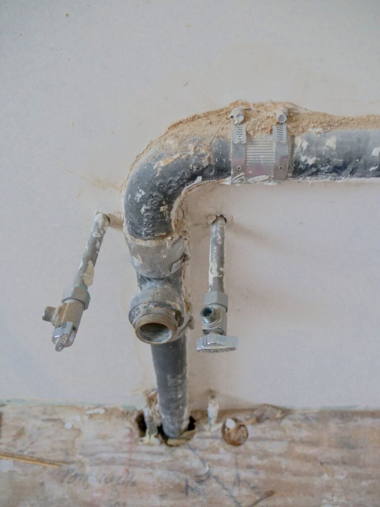 Close-up of a corroded pipe valve fitting